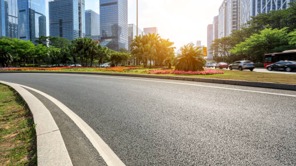 istock empty urban road and commercial buildings 950204014