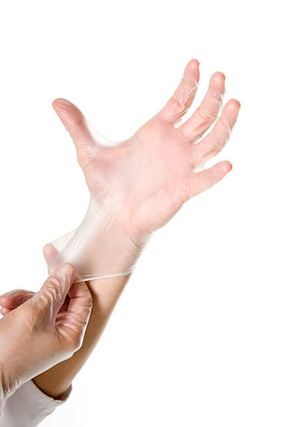 Doctor hand by getting gloves stock photo