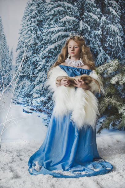 istock Snow Princess with the ferret in his hands 4562. 950211022