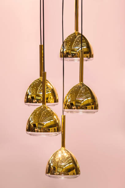 istock Modern streamlined mirror oval copper chandelier. Bubble metal gold shade pendant 950213534
