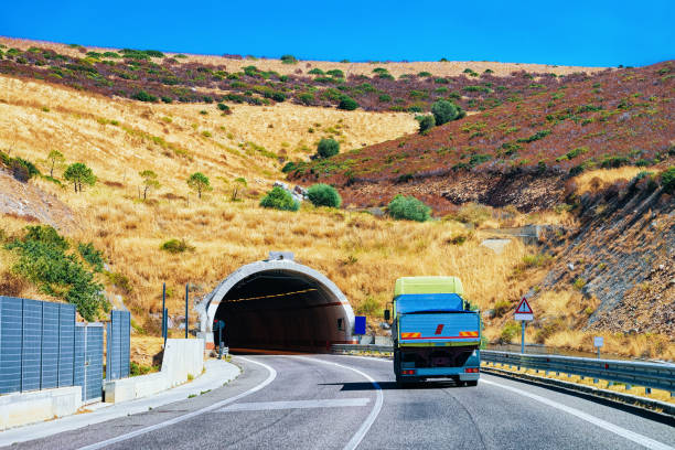 istock Truck on road with underpass in Cagliari Sardinia 950219788