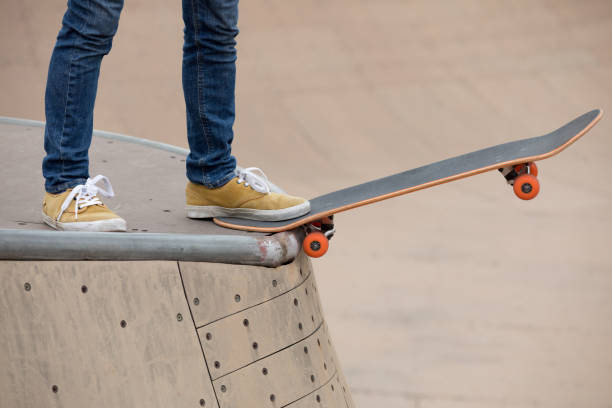 istock Skateboarder on skatepark ramp 950229042