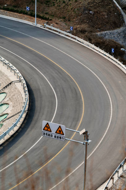 istock curve lane of mountain road 950229998