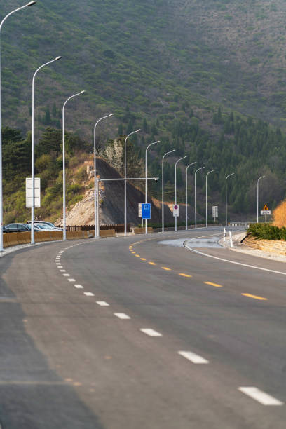 istock curve lane of mountain road 950230014