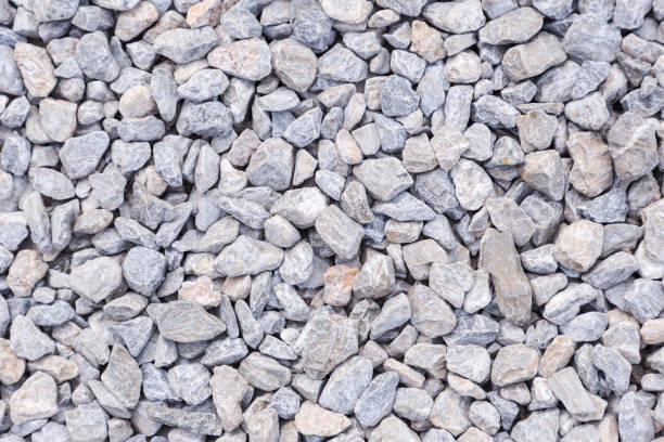 istock Stone pebbles texture or stone pebbles background for interior exterior decoration and industrial construction concept design. stone pebbles motifs that occurs natural. 950236548