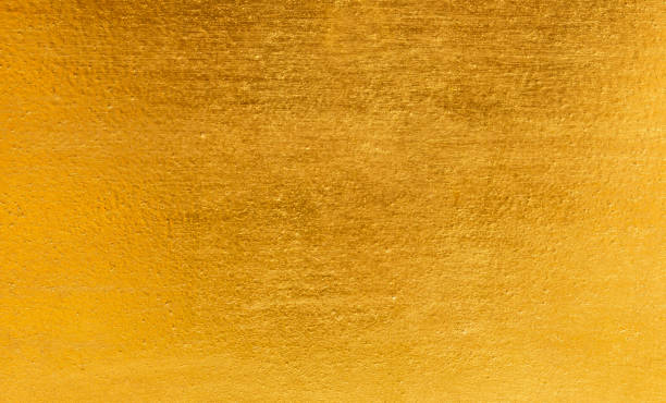 istock Shiny yellow leaf gold foil texture 950237024