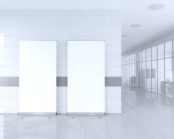istock Blank roll up banner stand in bright office interior with clipping path around ad stand. 3d illustration 950249672