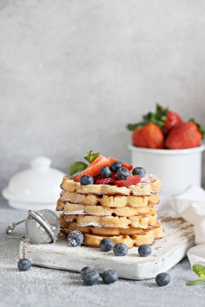 istock Waffles with fresh strawberry and blueberry. 950249894
