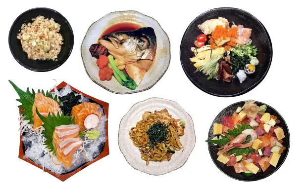assorted variety of japanese food served on dish isolated on white background with clipping path