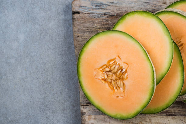 istock Cantaloupe melon slices on board 950253942