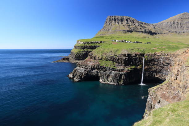 waterfall Gasadalur on faroe islands waterfall Gasadalur on faroe islands eysturoy photos stock pictures, royalty-free photos & images