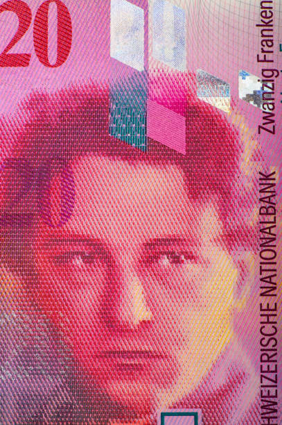 istock Swiss banknotes - a collection of old and new twenty franc notes. 950257470