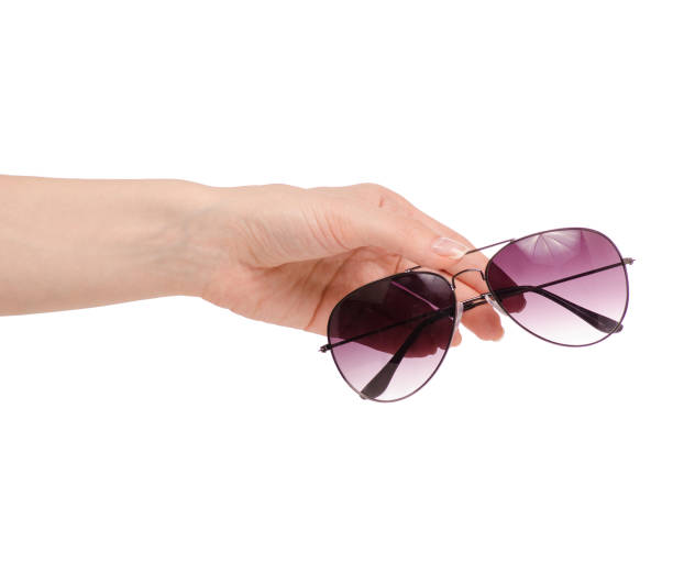 istock Female sunglasses in hand 950261454