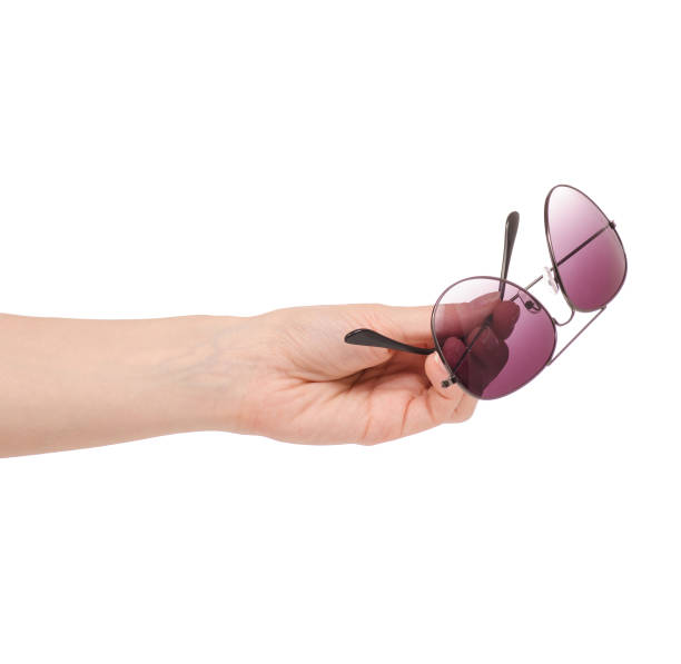 istock Female sunglasses in hand 950261458