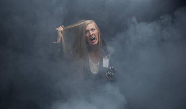 istock Businesswoman holding a bomb 950264890