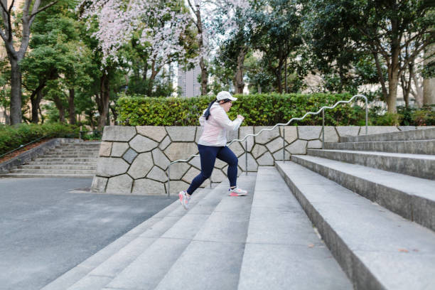 istock Plus size Japanese woman training at steps 950265974