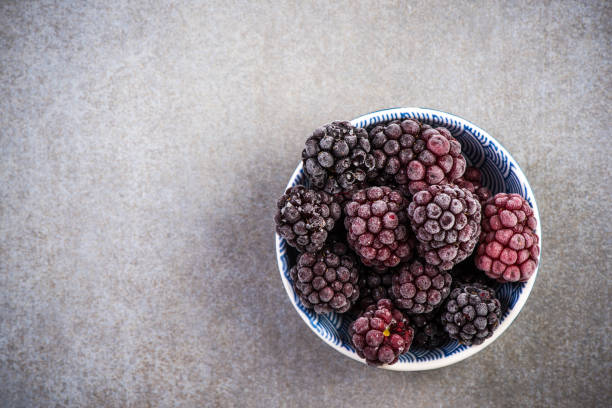 istock Frozen blackberry fruits, close up 950266858
