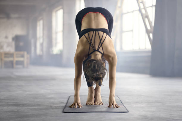 istock Sportive girl yoga training 950272130