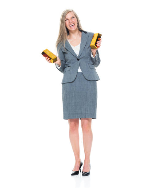 istock Businesswoman holding gold bars 950275478