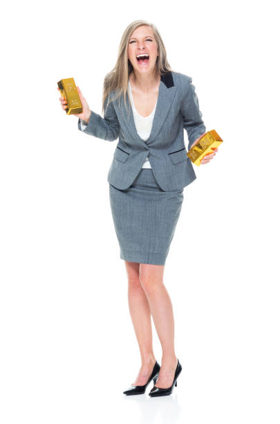 istock Businesswoman holding gold bars 950275570