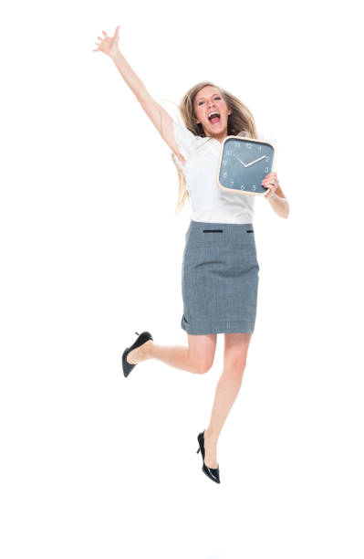 istock Businesswoman is holding a clock 950275880