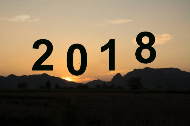 istock 2018 new year with sunset and mountain background 950287806