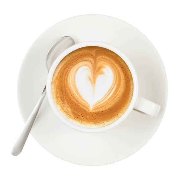 istock White cup and saucer coffee capuccino  heart spoon 950287980