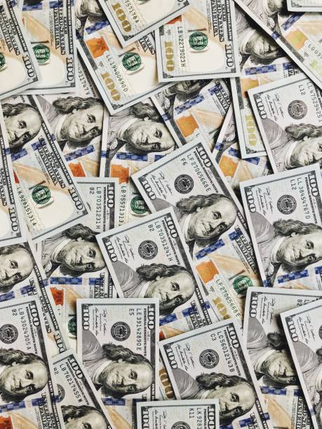 istock textural background of one hundred dollar bills 950288972