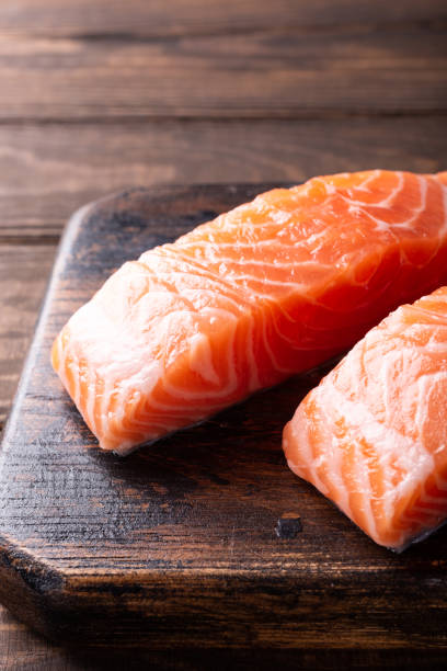 istock Fresh raw salmon fillet, flat lay 950289162