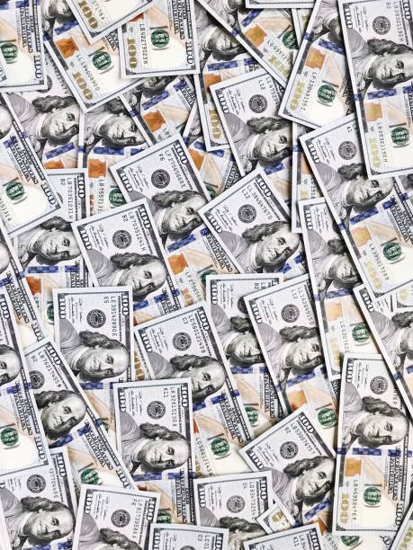 istock textural background of one hundred dollar bills 950289496