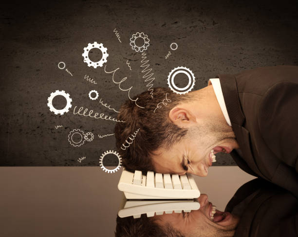 istock Gear wheels jumping from depressed head 950289870