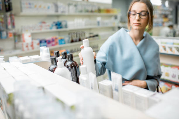 istock Taking a bottle with cosmetics in te pharmacy 950292148