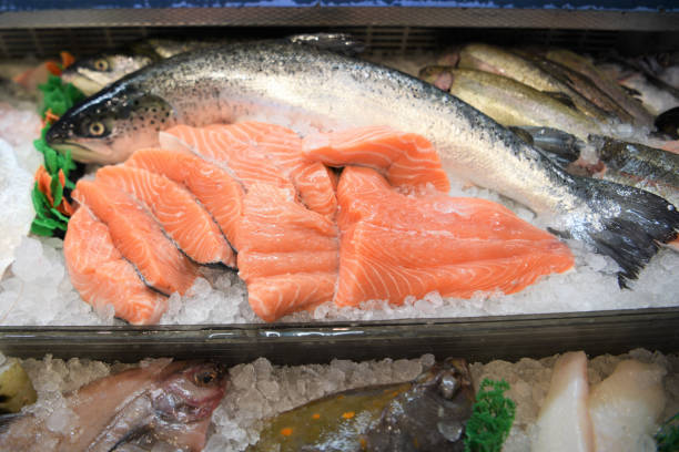 istock whole fresh raw salmon at a fishmongers 950292574