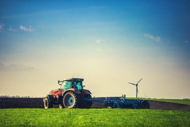 istock Farmer in tractor preparing farmland with seedbed for the next year. 950296458