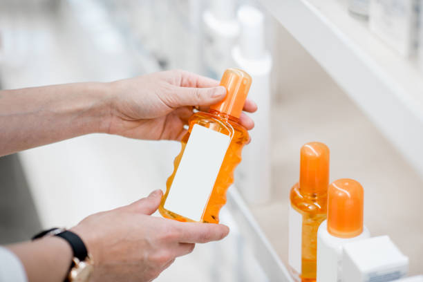 istock Taking sunscreen lotion at the pharmacy 950296636