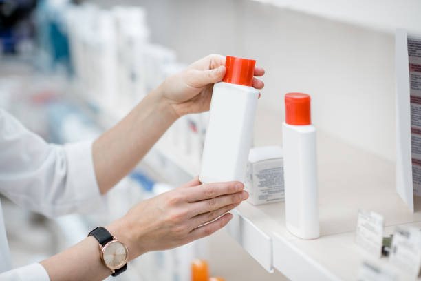 istock Taking sunscreen lotion at the pharmacy 950296666