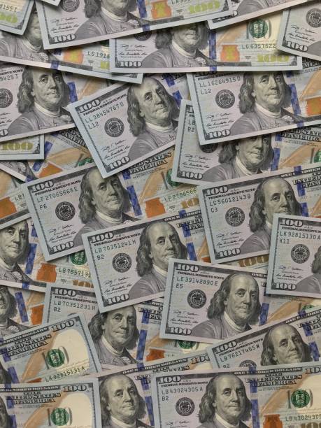 istock textural background of one hundred dollar bills 950296870