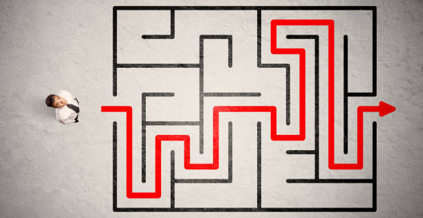 lost businessman found the way in maze with red arrow - maze solution business plan imagens e fotografias de stock