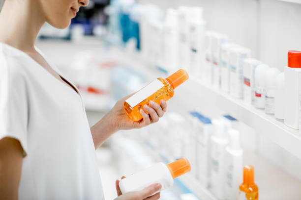 istock Taking sunscreen lotion at the pharmacy 950299682