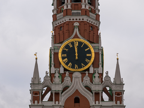 Kremlin tat the Red square in Moscow under dramatic overcast sky