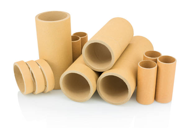 istock A bunch of brown industrial paper core isolated on white background with shadow reflection. A lot of paper cores or paper tubes on white backdrop. Brown paper rolls. 950302536