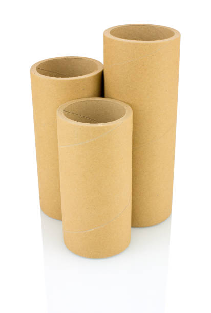 istock A bunch of brown industrial paper core isolated on white background with shadow reflection. A lot of paper cores or paper tubes on white backdrop. Brown paper rolls. 950305066