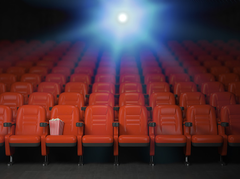 Cinema and movie theater concept background. Empty rows of red seats with pop corn. 3d illustration