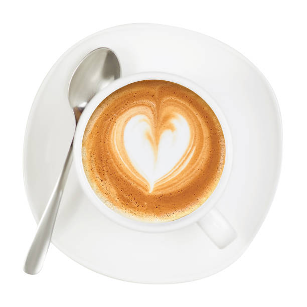 istock White cup and saucer coffee capuccino  heart spoon 950313372