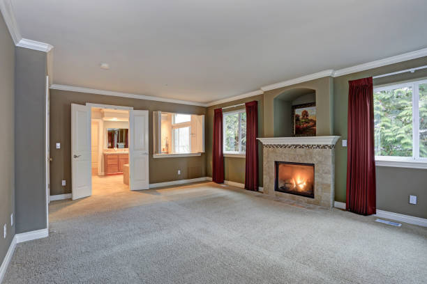 istock Spacious red and gray living room with high ceiling 950314498