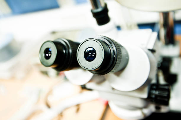 istock Eyepiece of A High Resolution Optical Microscope In The Laboratory / Cleanroom 950315040