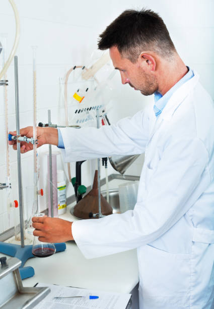 istock Professional man working with quality tests of wine 950315240