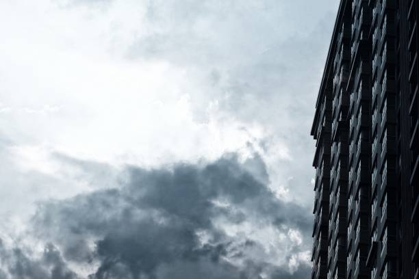 istock New Condominium Building with Cloudy Day Background. 950318232
