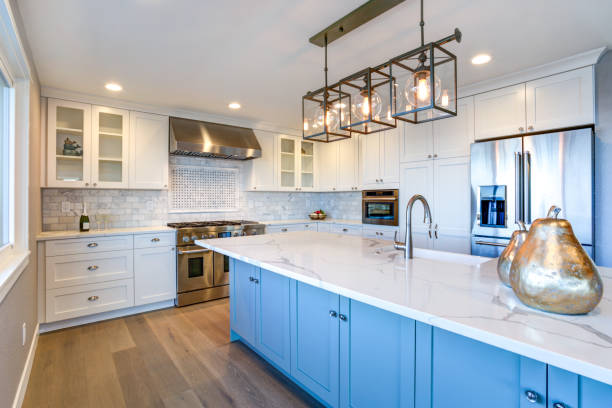 istock Beautiful white kitchen with large island. 950318878