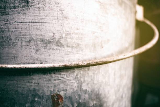 istock Close-up Old Aluminum Bucket with Light Leak. (Selective Focus) 950319594